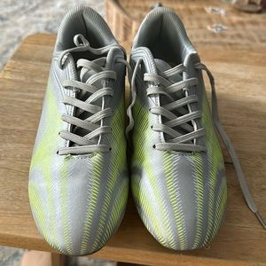 Grey and yellow cleats